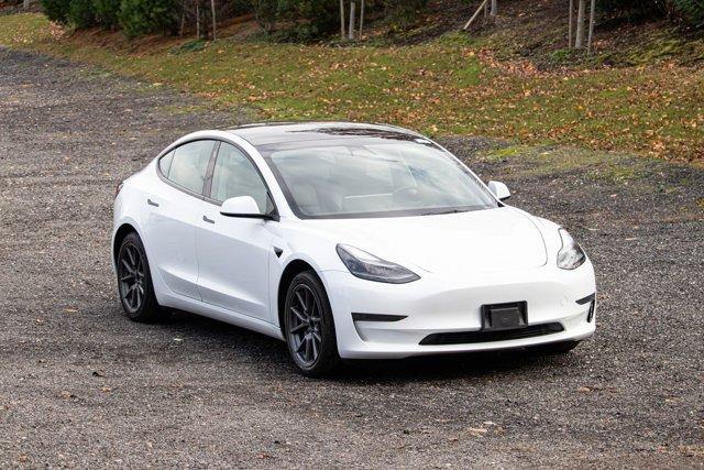 used 2023 Tesla Model 3 car, priced at $18,995