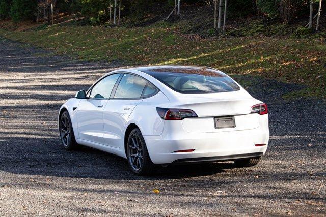 used 2023 Tesla Model 3 car, priced at $18,995