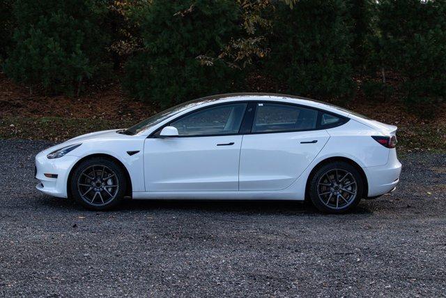 used 2023 Tesla Model 3 car, priced at $18,995