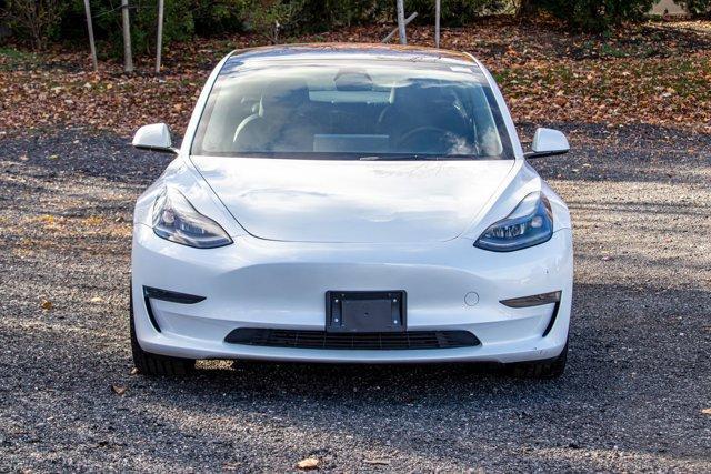 used 2023 Tesla Model 3 car, priced at $18,995