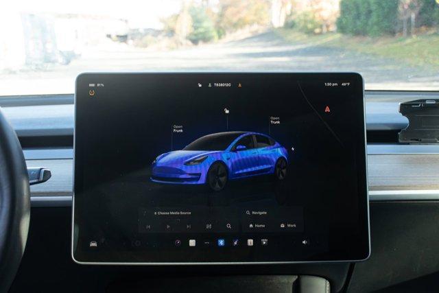 used 2023 Tesla Model 3 car, priced at $18,995