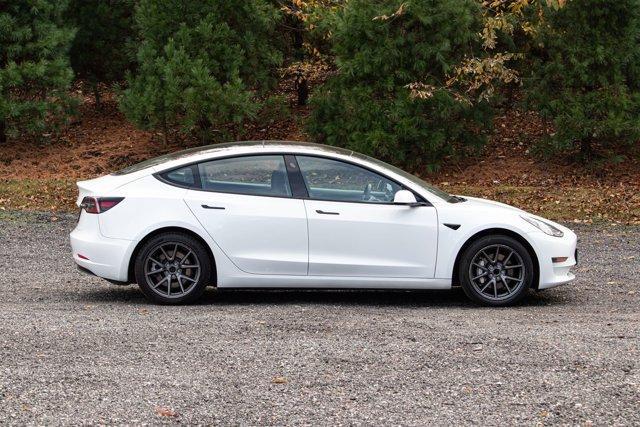 used 2023 Tesla Model 3 car, priced at $18,995