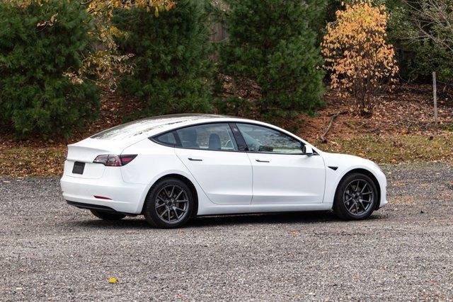 used 2023 Tesla Model 3 car, priced at $18,995