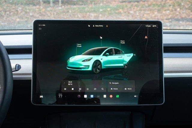 used 2023 Tesla Model 3 car, priced at $18,295