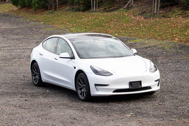 used 2023 Tesla Model 3 car, priced at $18,295