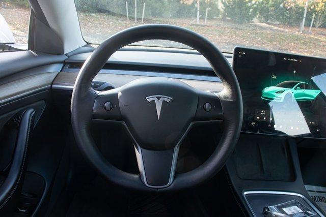 used 2023 Tesla Model 3 car, priced at $18,295