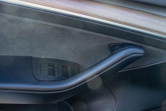 used 2023 Tesla Model 3 car, priced at $18,295