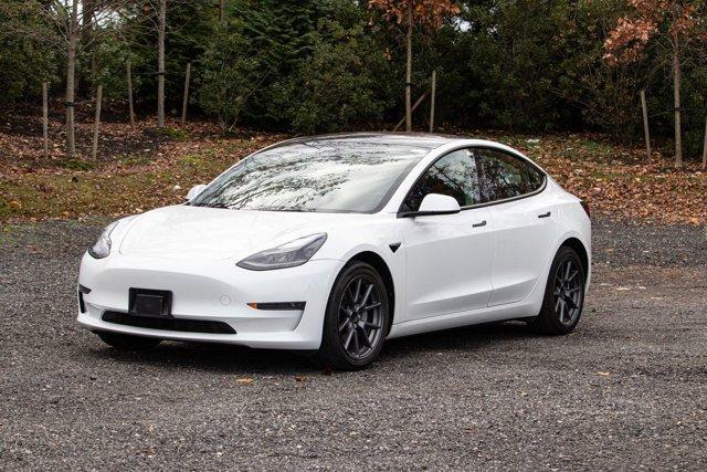 used 2023 Tesla Model 3 car, priced at $18,295