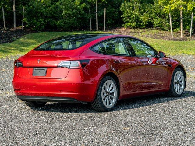 used 2023 Tesla Model 3 car, priced at $20,395