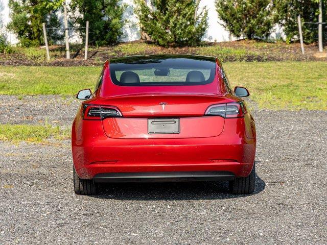 used 2023 Tesla Model 3 car, priced at $20,395