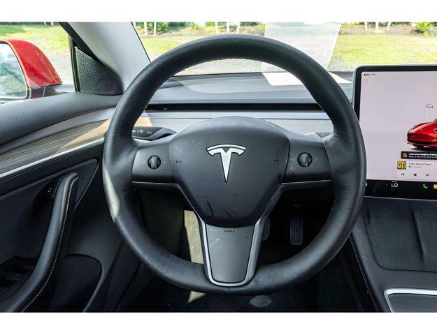 used 2023 Tesla Model 3 car, priced at $20,395