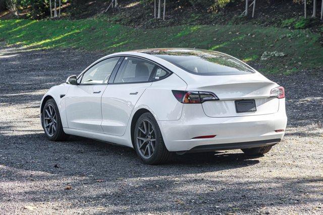 used 2023 Tesla Model 3 car, priced at $17,695