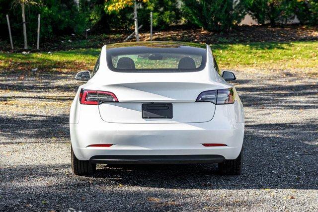 used 2023 Tesla Model 3 car, priced at $17,695