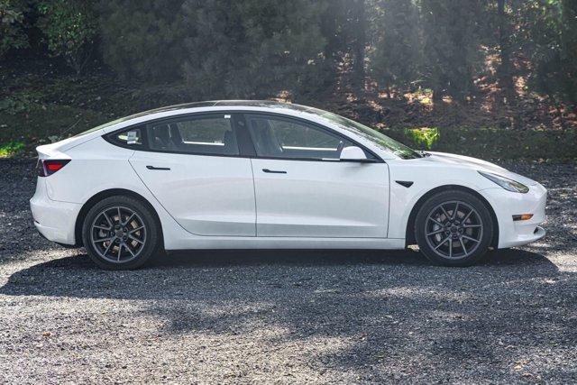 used 2023 Tesla Model 3 car, priced at $17,695