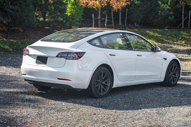 used 2023 Tesla Model 3 car, priced at $17,695