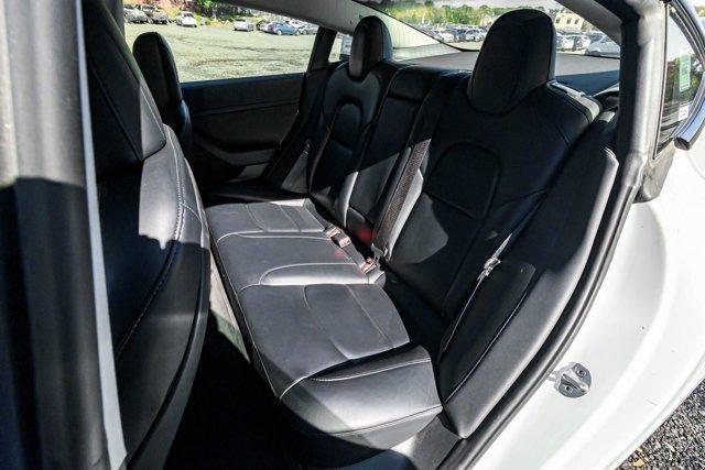 used 2023 Tesla Model 3 car, priced at $17,695