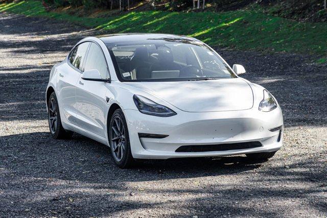 used 2023 Tesla Model 3 car, priced at $17,695