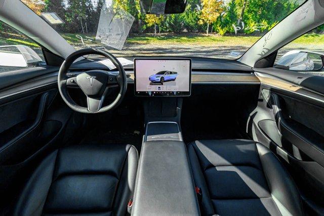 used 2023 Tesla Model 3 car, priced at $17,695