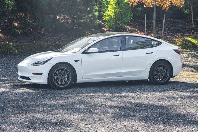used 2023 Tesla Model 3 car, priced at $17,695