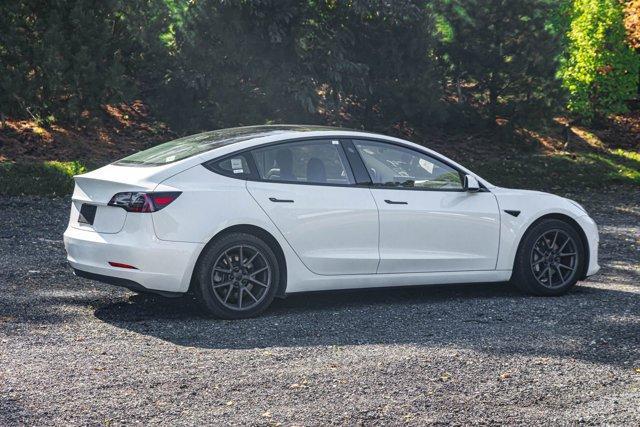 used 2023 Tesla Model 3 car, priced at $17,695