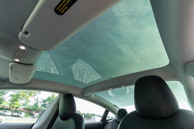 used 2021 Tesla Model 3 car, priced at $22,495