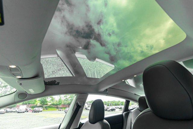 used 2022 Tesla Model 3 car, priced at $21,495