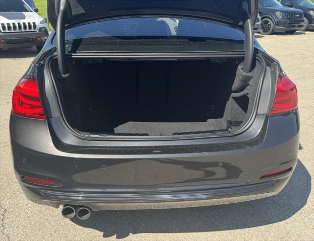 used 2018 BMW 330 car, priced at $15,000