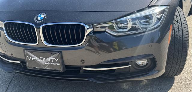 used 2018 BMW 330 car, priced at $15,000