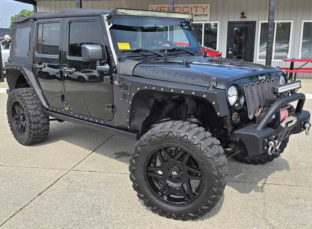 used 2015 Jeep Wrangler Unlimited car, priced at $22,800