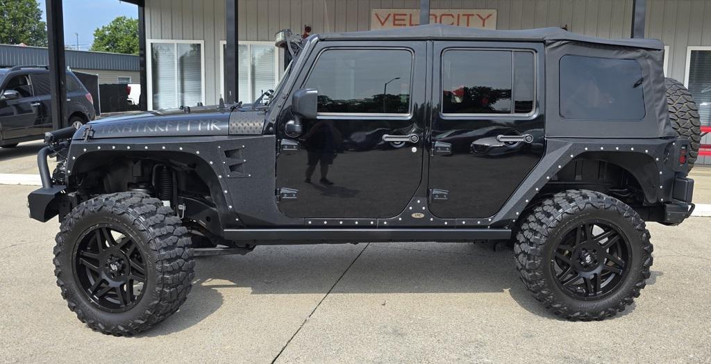 used 2015 Jeep Wrangler Unlimited car, priced at $22,800