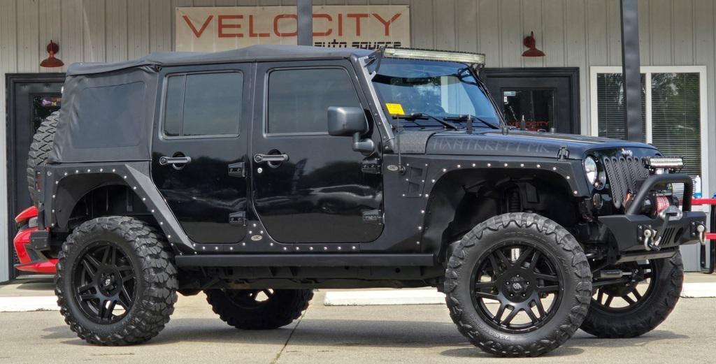used 2015 Jeep Wrangler Unlimited car, priced at $22,800