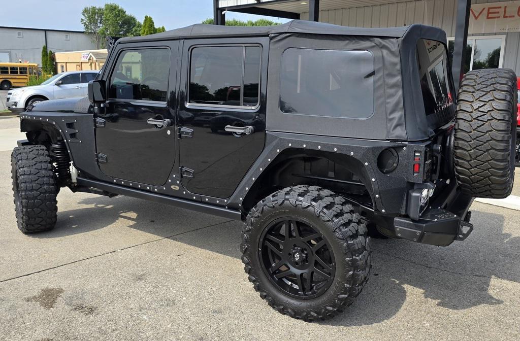 used 2015 Jeep Wrangler Unlimited car, priced at $22,800