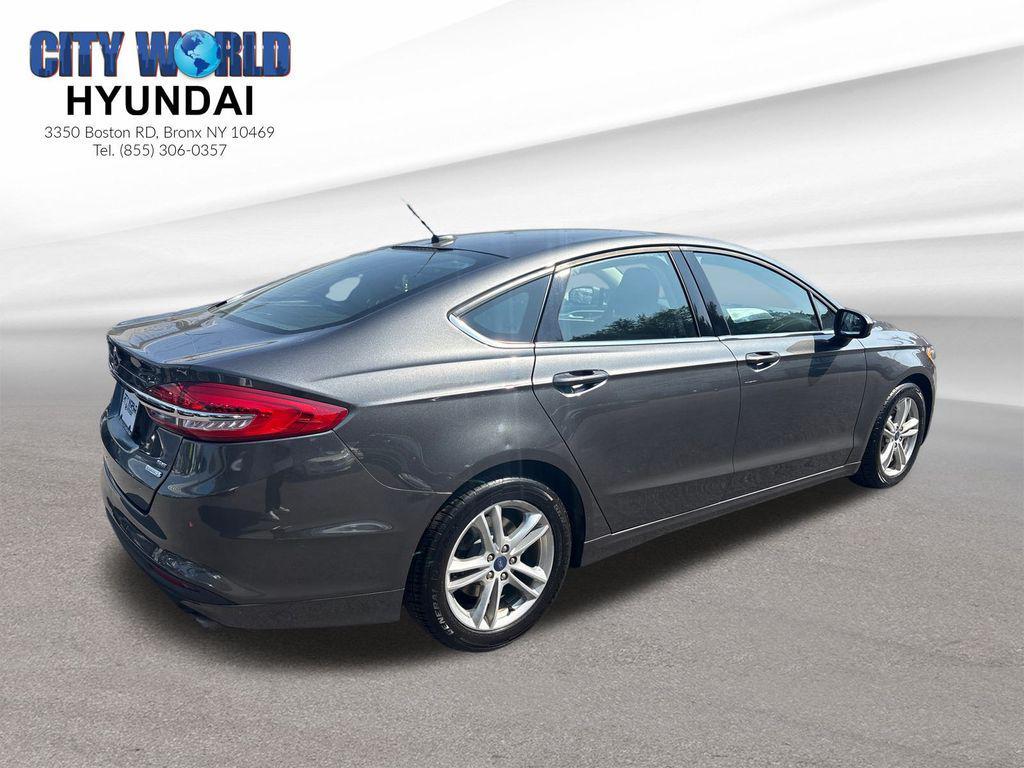 used 2018 Ford Fusion car, priced at $10,767