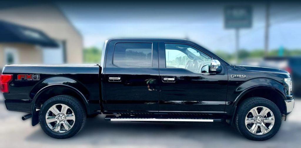 used 2018 Ford F-150 car, priced at $23,900