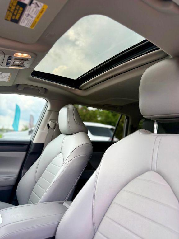 used 2021 Toyota Highlander Hybrid car, priced at $33,900