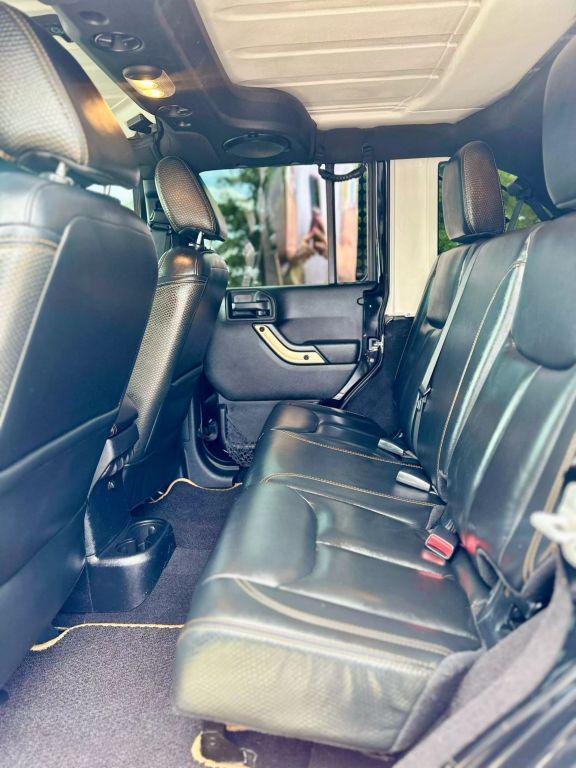 used 2014 Jeep Wrangler Unlimited car, priced at $14,900
