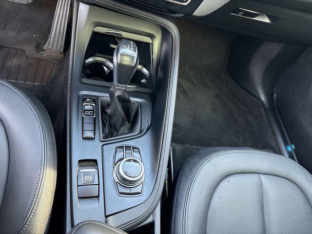 used 2018 BMW X1 car, priced at $19,049