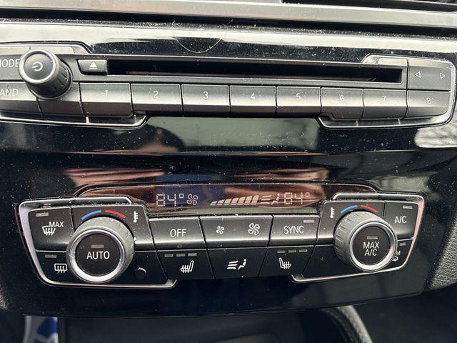 used 2018 BMW X1 car, priced at $19,049