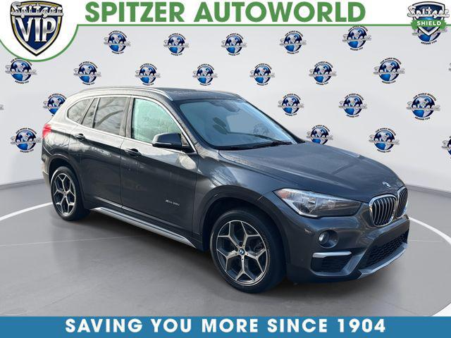used 2018 BMW X1 car, priced at $19,049