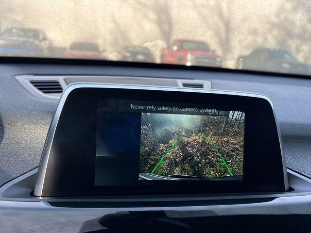 used 2018 BMW X1 car, priced at $19,049