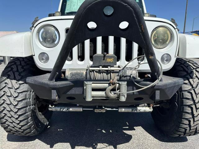 used 2014 Jeep Wrangler Unlimited car, priced at $23,995