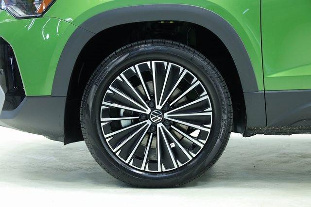 new 2025 Volkswagen Taos car, priced at $27,283