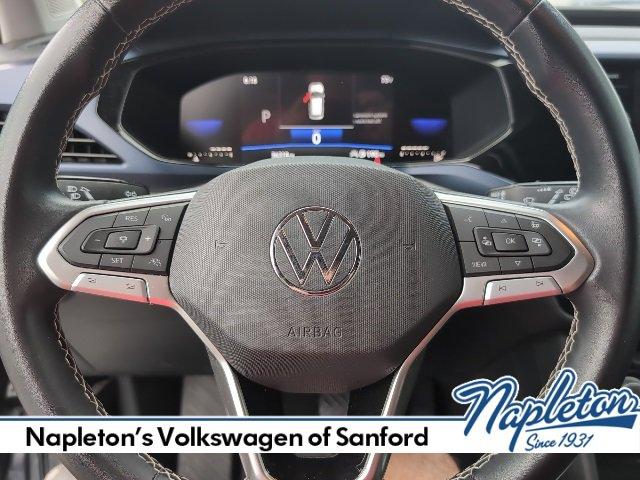 used 2023 Volkswagen Taos car, priced at $20,000