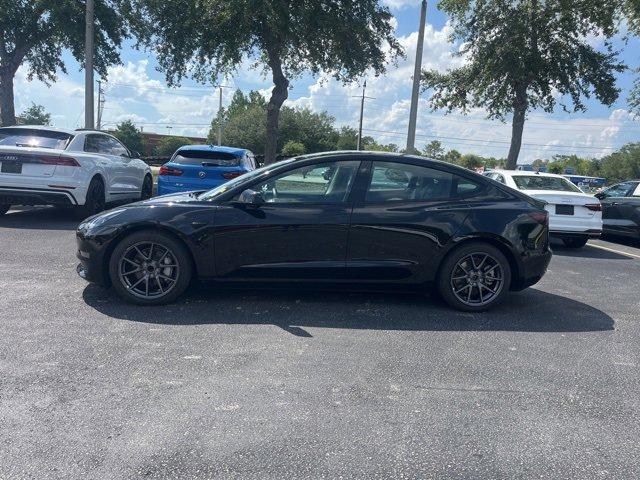 used 2023 Tesla Model 3 car, priced at $23,500
