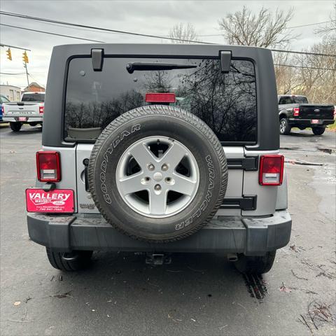 used 2016 Jeep Wrangler Unlimited car, priced at $18,590