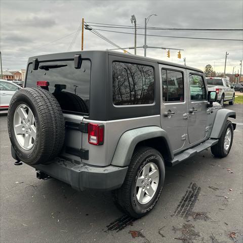 used 2016 Jeep Wrangler Unlimited car, priced at $18,590