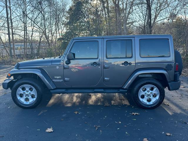 used 2014 Jeep Wrangler Unlimited car, priced at $22,290