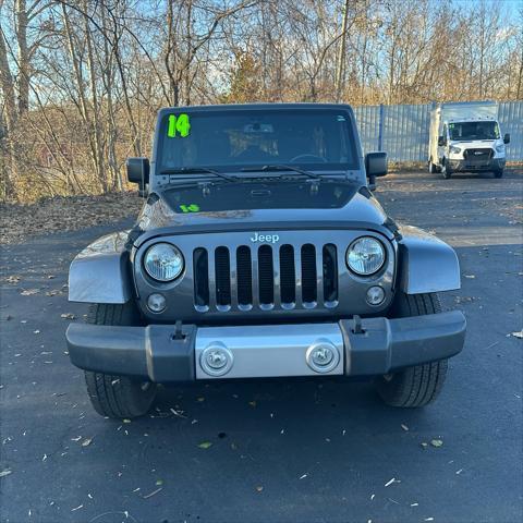 used 2014 Jeep Wrangler Unlimited car, priced at $22,290