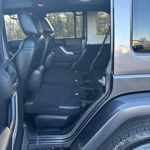 used 2014 Jeep Wrangler Unlimited car, priced at $22,290