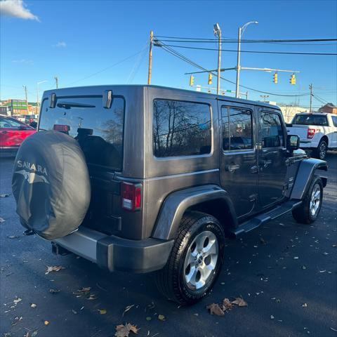 used 2014 Jeep Wrangler Unlimited car, priced at $22,290